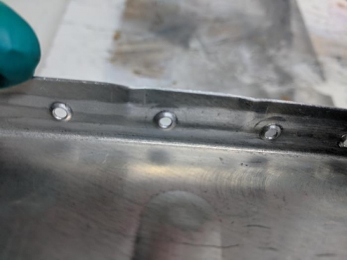 showing the dimple on a rib flange