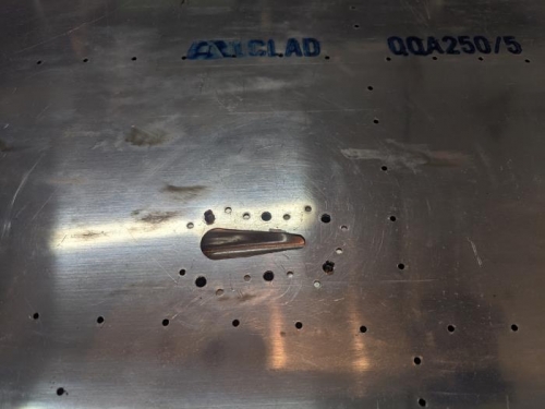 Cable fairing with holes for nut plates
