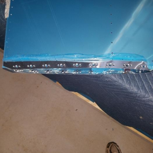 Dimpled nutplate holes of main skin