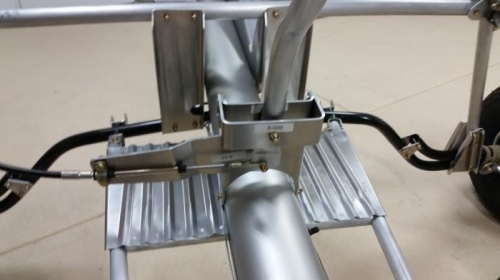 Rear cable attached to rear stick and bent arm