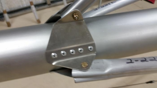 Gusset pin to belly rib pylon side