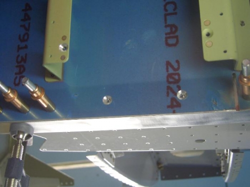 Machine countersunk holes at gear weldment
