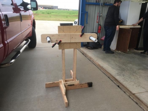 one half of a wing rotisserie in prep for wingcovering