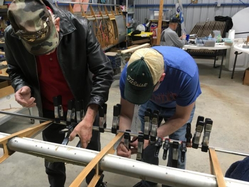 We still need more clamps!  Attempting to keep the basswood secured to the aluminum