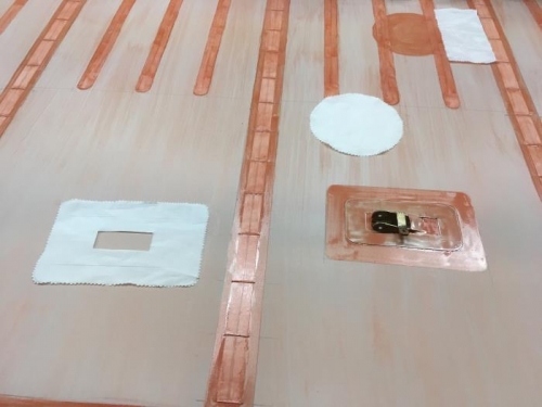 the fabric to cover the wing strut reinforcement bracket has been cut and ready to install