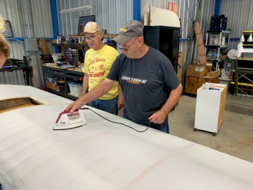 Steve begins the tightening process with the iron