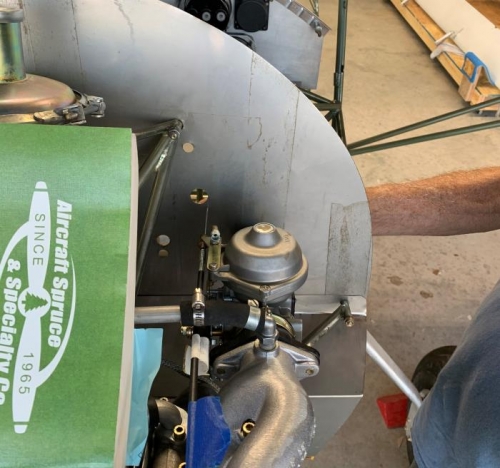 locating hole for throttle cable on port side