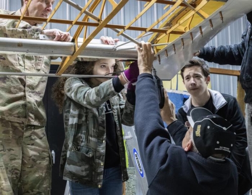 drilling holes in the bottom of the windtip for screws.