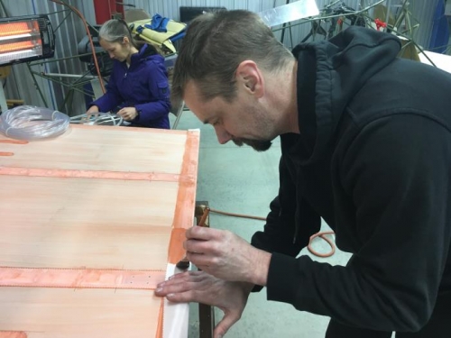 Bryan applying trailing edge tape