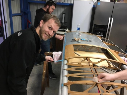Nick and Derek applying a coat of superfill to the leading edge of the left wing