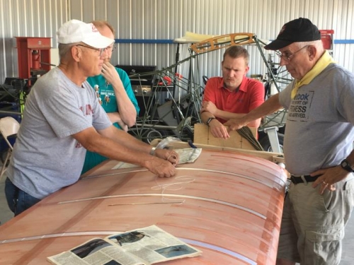 Eric showing the crew how to tie the knots for rib lacing