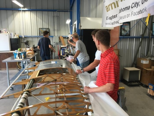 Polytacking the bottom wing covering to the leading edge