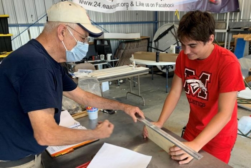 Antonin and Pete laying out attachment points for windshield on support
