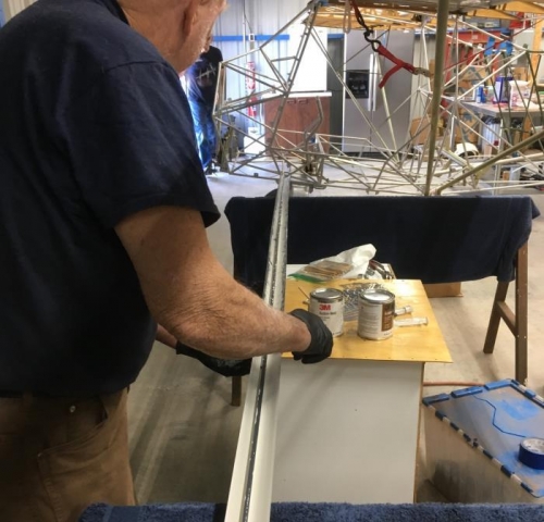 Art applying epoxy to leading edge