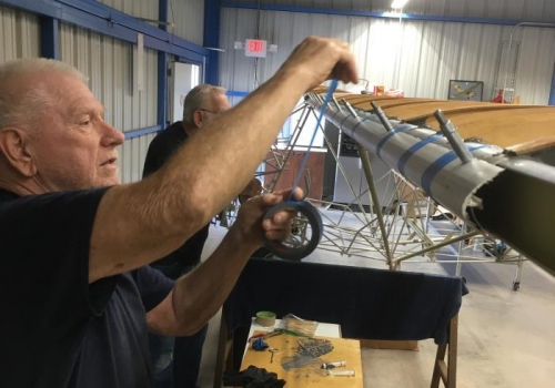 Art and Terry applying tape for clamping pressure while clecos hold for positioning