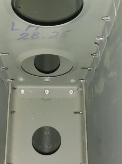 Rib riveted to center nose rib