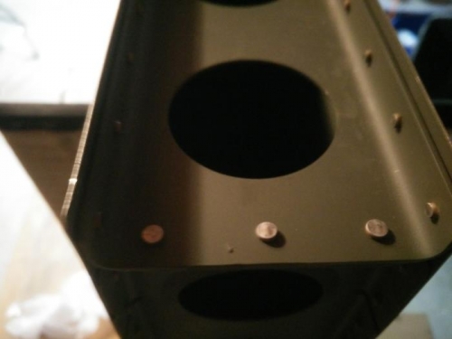 Solid rivet on outboard ribs