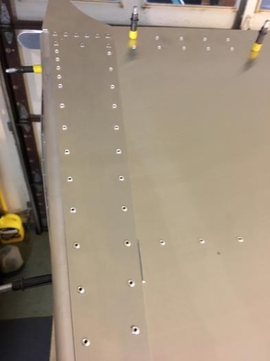 Upper left fuselage mating gusset riveted