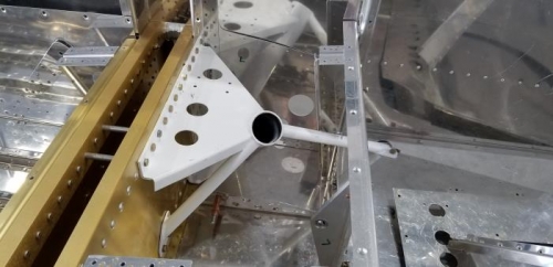Left main landing gear bracket bolted in place