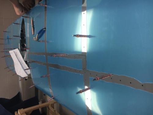 burning off the blue tape so we have acess to the skin