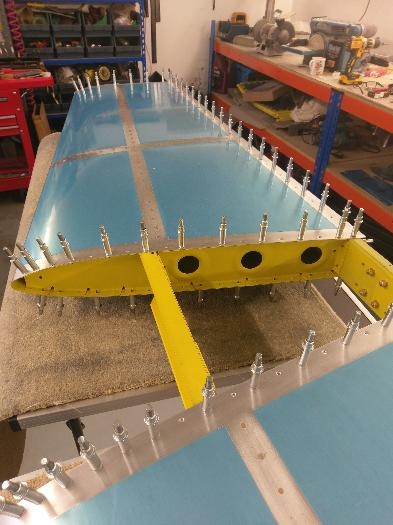 Rib to skin riveting.