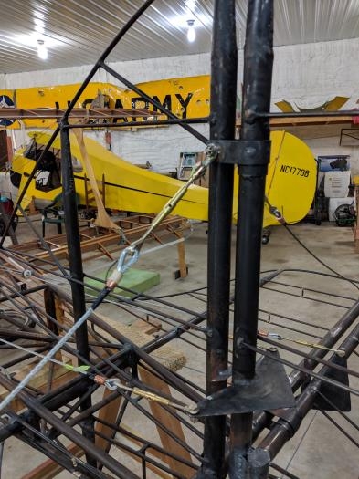 tail brace wire attachment