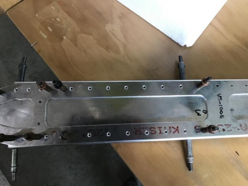 Holes all countersunk, including erroneous hole.