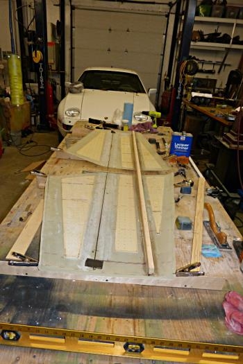 Front spar bonded to skin