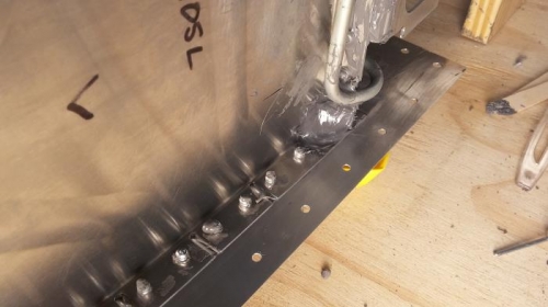 tank sealant applied to corner seam