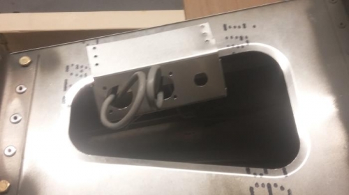 bracket fitted to tail