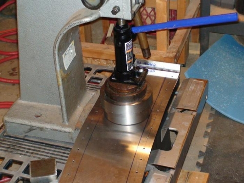 Forming flange with dies and press