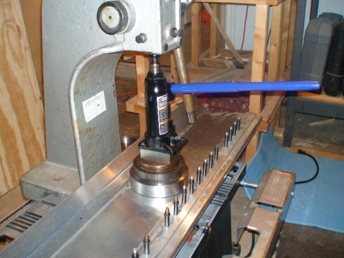 Using a 2 ton hydraulic jack between the dies and the top of the press