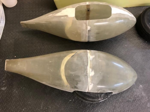 A bit more trimming and the wheel will fit!