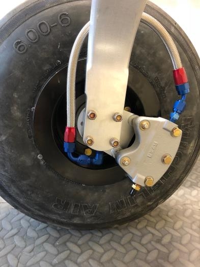 Up an over route? better to keep brake lines inside the wheel pants and away from the ground