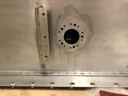 Float sender hole made through the rear tank baffle