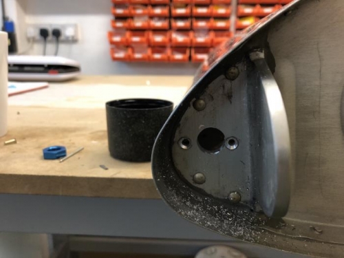 Hole for new location of AN bulkhead fitting. Two 470 rivets removed .