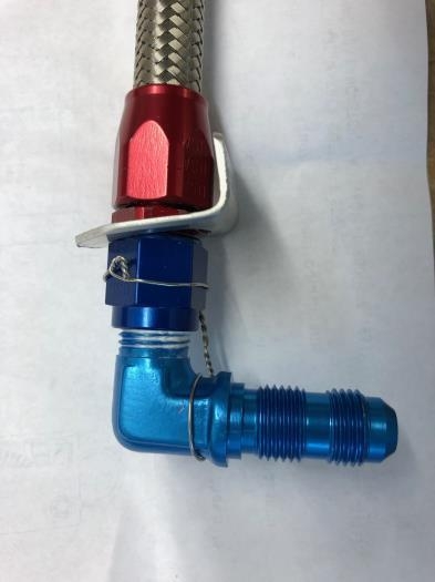 safety wired tank fitting and anti-rotation plate