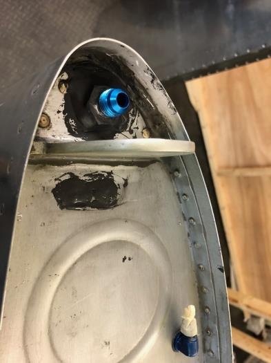 flop tube bulkhead fitting sealed and attached.