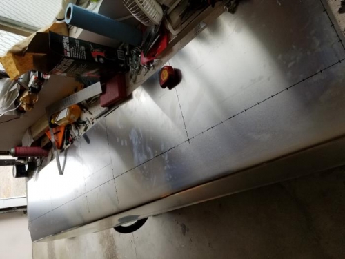 Marked/drilled pilot holes for rivets