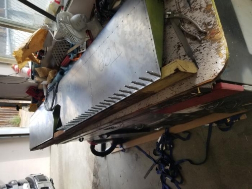 Drilled/clecoed trailing edge on passenger side