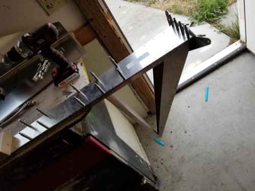 Drilled and clecoed rear rib number 2 to main spar