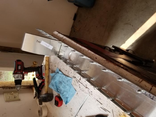 I laid out and aligned the ribs onto the spar, and drilled and clecoed the rear ribs in place