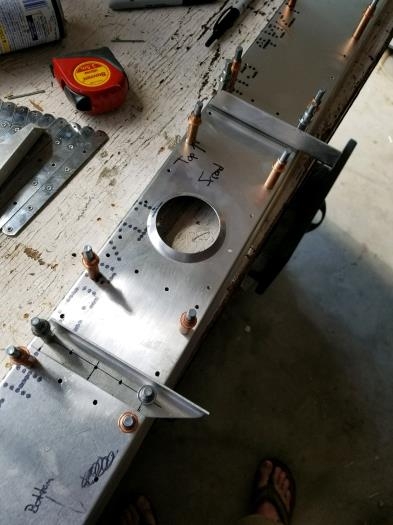 Positioned and clecoed front mounting bracket