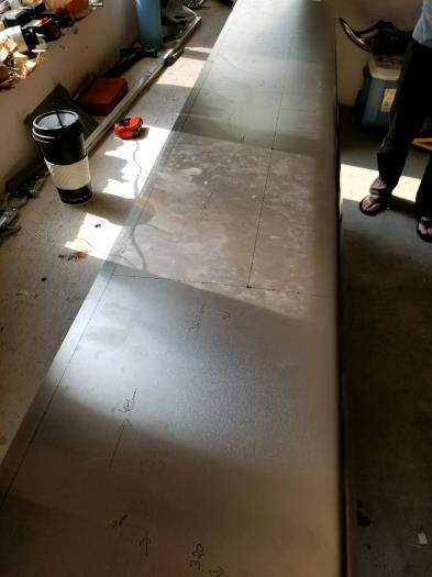 Rivet marks and pilot holes drilled on bottom of skin