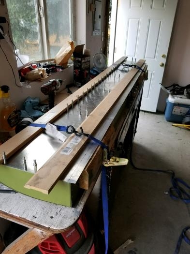 Marked holes, and strapped skin in place before clecoing