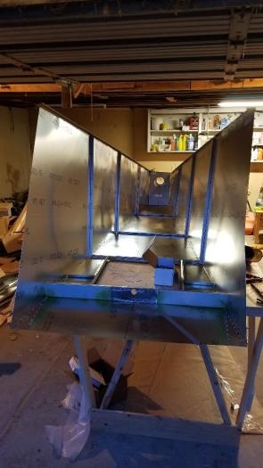 Temporarily fastened side skins to bottom skin