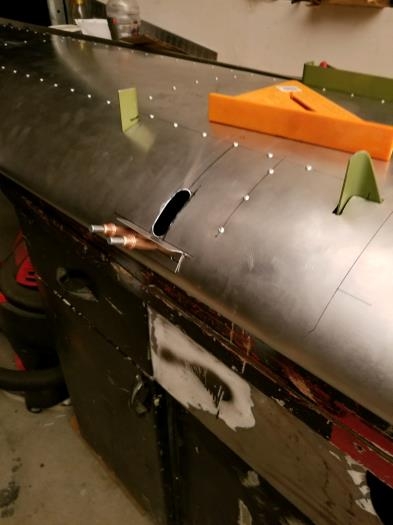 Added L-bracket for the elevator cable hole