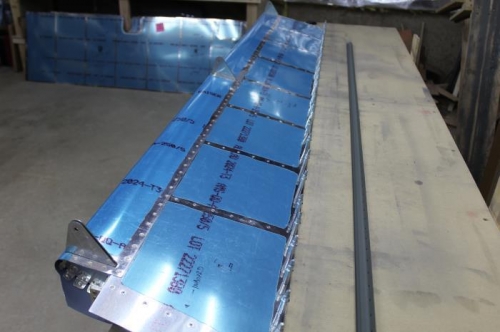 Bottom of Left Flap Riveted