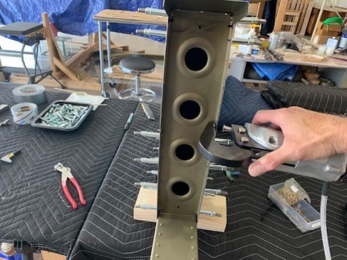 Squeezing edge rivets