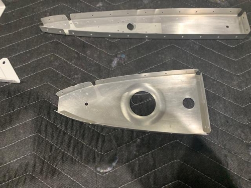 Hole in LE rib for wire conduit.